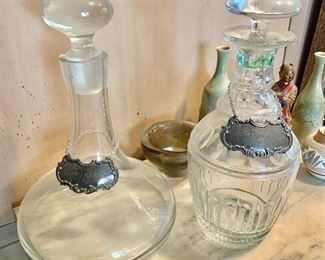 Vintage decanters with silver liquor tags