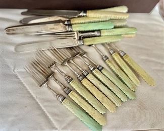 Set of 12 knives and forks with carved handles sterling silver 