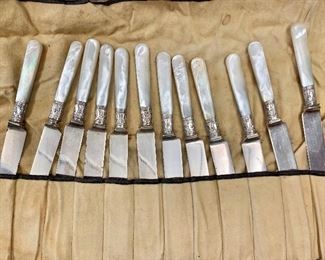 Mother of pearl handled knives, sterling bands 