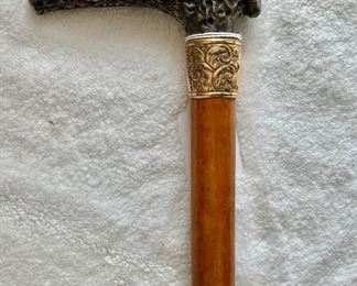 Antique cane with gold border 