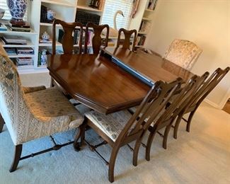 #1	Double pedistel dining table with 6 dining chairs and 2 upholstered side chairs - 64-100x42x28	 $420.00 
