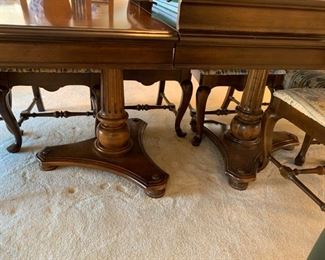 #1	Double pedistel dining table with 6 dining chairs and 2 upholstered side chairs - 64-100x42x28	 $420.00 
