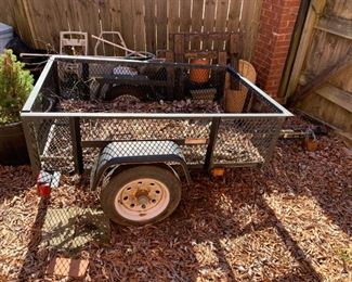 #58	Carry-On Black Utility Trailer - 16x63x45 - (16 w/tire 29)	 $150.00 
