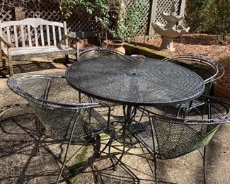 #69	Wrought Iron Black Round Table w/4 chairs - 48Round x 29Tall	 $125.00 
