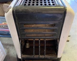 
#112	Whie/Black Porcelain Coated Gas Heater   12x8x16	 $20.00 
