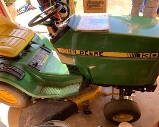 #124	John Deere 130 - 30" cut - Cracked Seat w/bagger	 $400.00 
