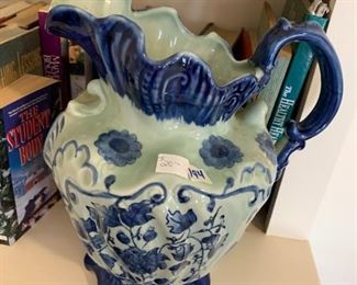 #194	green/blue pitcher with flowers on side	 $20.00 
