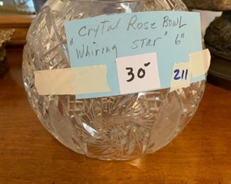 #211	Crystal Rose bowl Whiring star 6 inch tall 	 $30.00 
