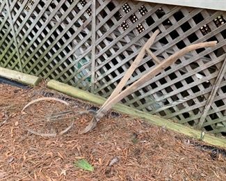 #288	antique plow 66 in metal wheel and plow 	 $100.00 
