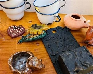 Antique cast iron match holder, enamel mugs 