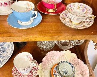 Antique teacups and decorative plates 