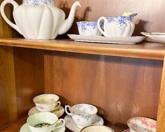 Antique teacups and decorative plates 