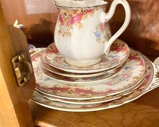 Antique teacups and decorative plates 