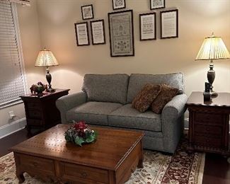 Neutral gray loveseat & Ethan Allen coffee table with 4 drawers