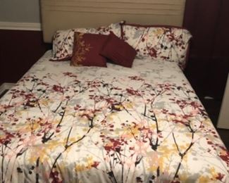 Lovely queen bed, linen headboard and memory foam mattress. 