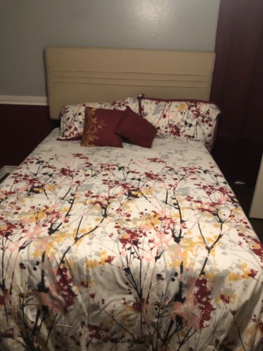 Lovely queen bed, linen headboard and memory foam mattress. 