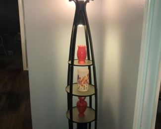 Pretty lamp with glass shelves and spotlight for all your collectables.