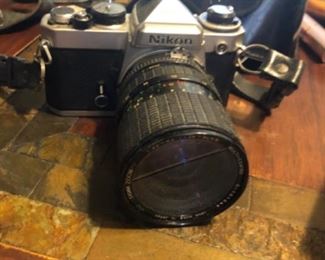 Nikon film camera and telephoto lense