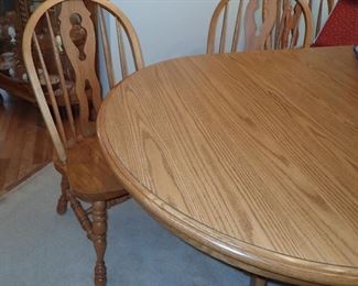 OAK DINING TABLE AND LEAVES & 8 - OAK CHAIRS
