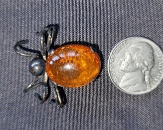 One-of-a-kind Amber spider brooch