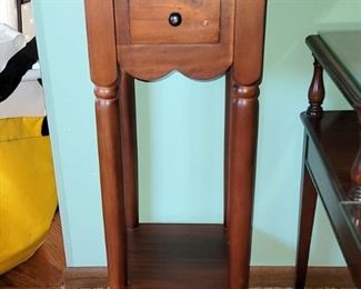 Wood accent table. Very well made. Can use as a plant stand