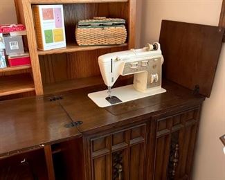 Singer sewing machine with cabinet