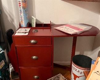 Fold down work station with filing and supply storage