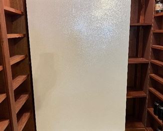 Upright Frigidaire freezer