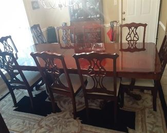 Cherry Finish Duel Pedestal Dining Table with 8 Chairs and extension leaf. 