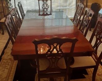 Cherry Finish Duel Pedestal Dining Table with 8 Chairs and extension leaf. 