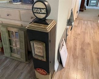 Old gas pump opens to store DVD’s, with DVD’s