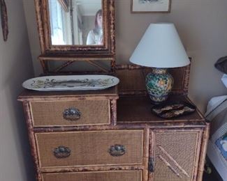 Burnt bamboo and rattan dresser vanity with mirror.