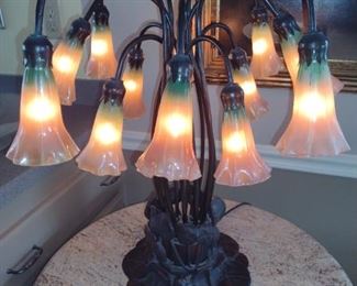 12 light Lily table lamp by Tiffany? No signatures.