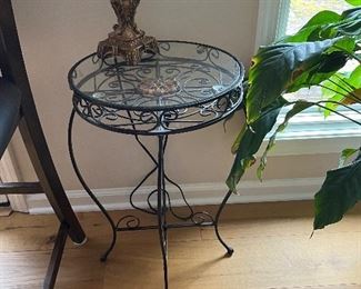 Glass top iron table