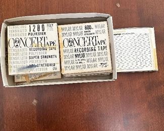 Box of vintage reel-to-reel tapes.
