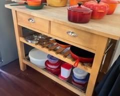 Crate & Barrel Butcher block   48" x 24" Holds 9 wine bottles.