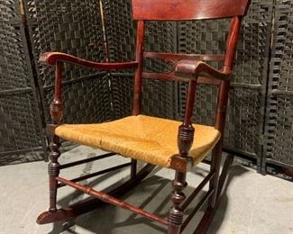 Vintage Dark Wood Rocker with Cane Seat