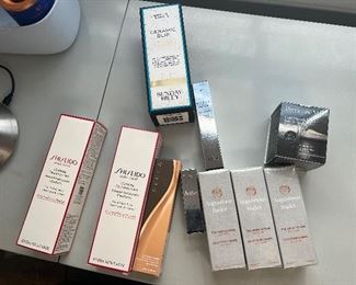 Lots of designer makeup and cleanser, all new in box