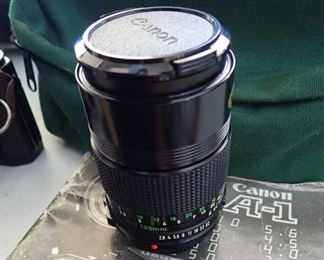 CANON A-1 FILM CAMERA WITH BAG AND EXTRA LENS - AND FILM - 