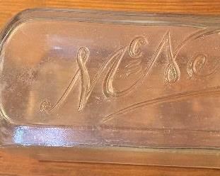 Embossed McNeil Medicine Bottle