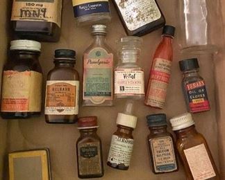 Assorted Medicinal Bottles and Tins