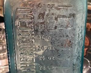 Embossed Huncke Chemical Company Bottle 