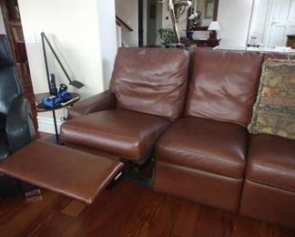 $400. Long Brown Leather Tucker Sofa with Dual electric Recliners (one on each end with two cushions in between).  Great condition very minor normal wear.  Heavy item, bring helper and appropriate vehicle.