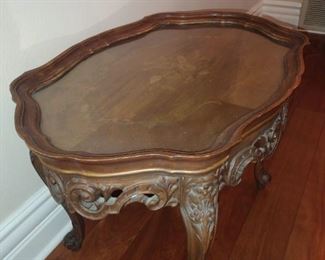 Antique  carved Wood & Glass Butler Serving tray side table with inlaid Floral design top. Removable framed glass tray. Intricately carved  base with Cabriole Queen Anne legs and ball feet. $450.00