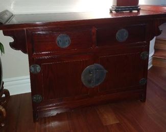 Beautiful Rosewood Chinese Chest. Ming Altar Chest Accented Hardware with traditional Chinese Symbols, including a Chinese locking pin- Leaf style safety key  latch on the main cabinet. Deep rich color. 