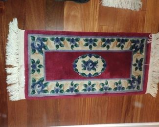 Small Wool entry rug with fringe ends. $60.00