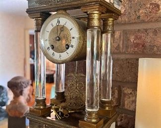MANTLE CLOCK WITH MATCHING CANDELABRA IN BRONZE AND CRYSTAL FROM PARIS