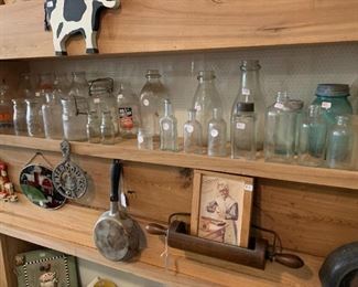 Milk bottle and other glass bottles 