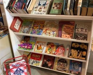 White bookshelf/ Magazine rack, books and magazines 