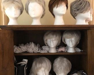 Soooooo many wigs.  